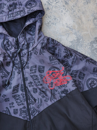 Vintage Ecko Unltd. All-Over Graphic Print Two-Tone Chevron Windbreaker Jacket (S/M)