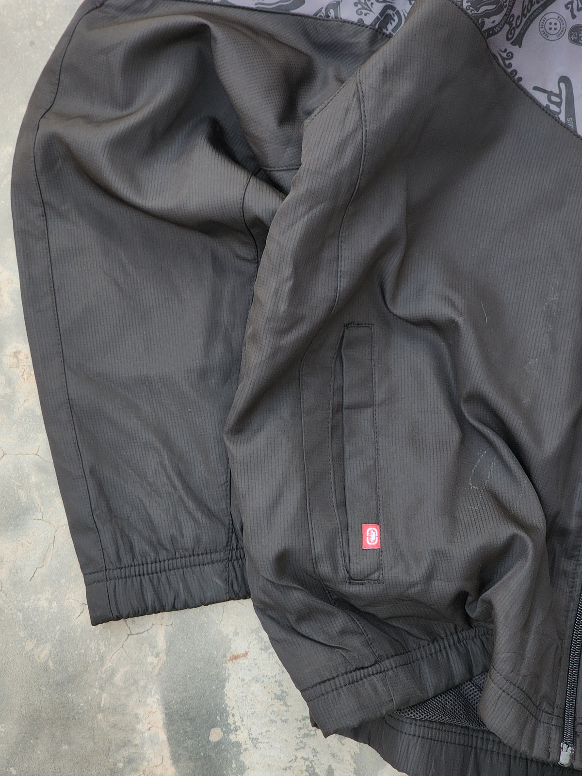 Vintage Ecko Unltd. All-Over Graphic Print Two-Tone Chevron Windbreaker Jacket (S/M)