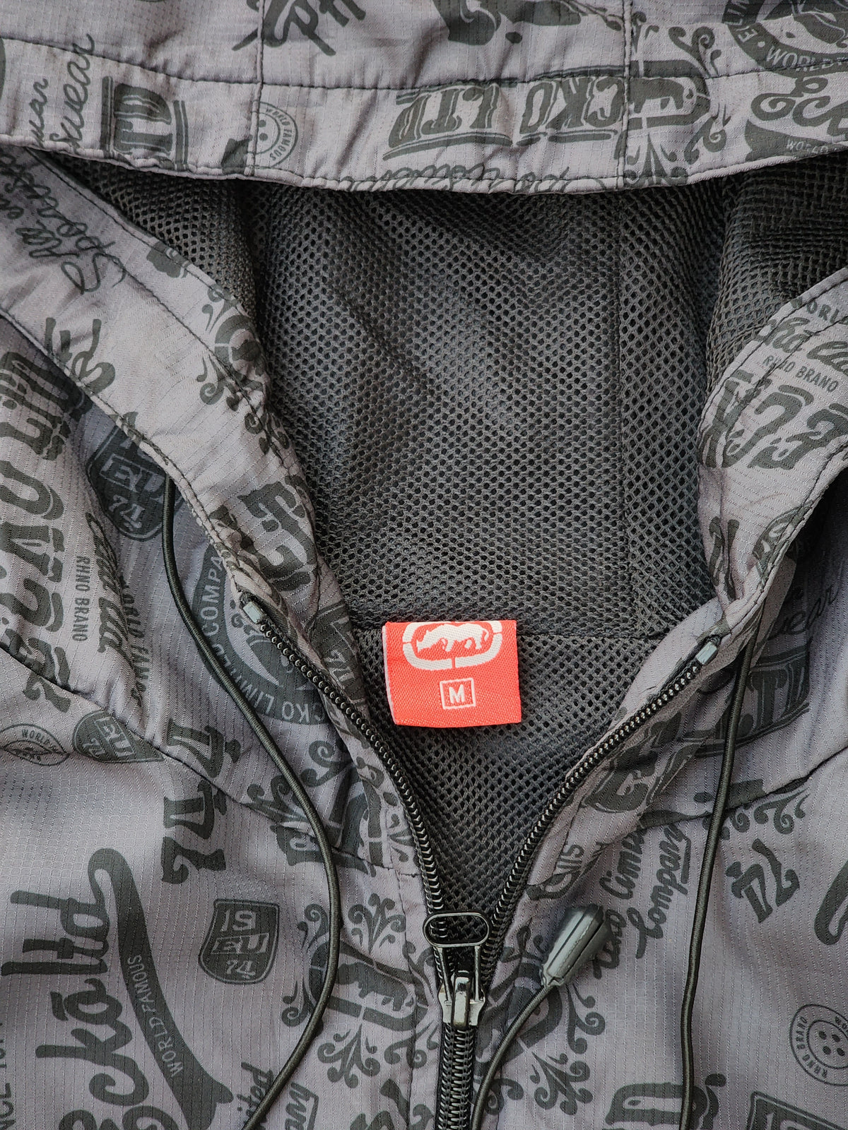 Vintage Ecko Unltd. All-Over Graphic Print Two-Tone Chevron Windbreaker Jacket (S/M)