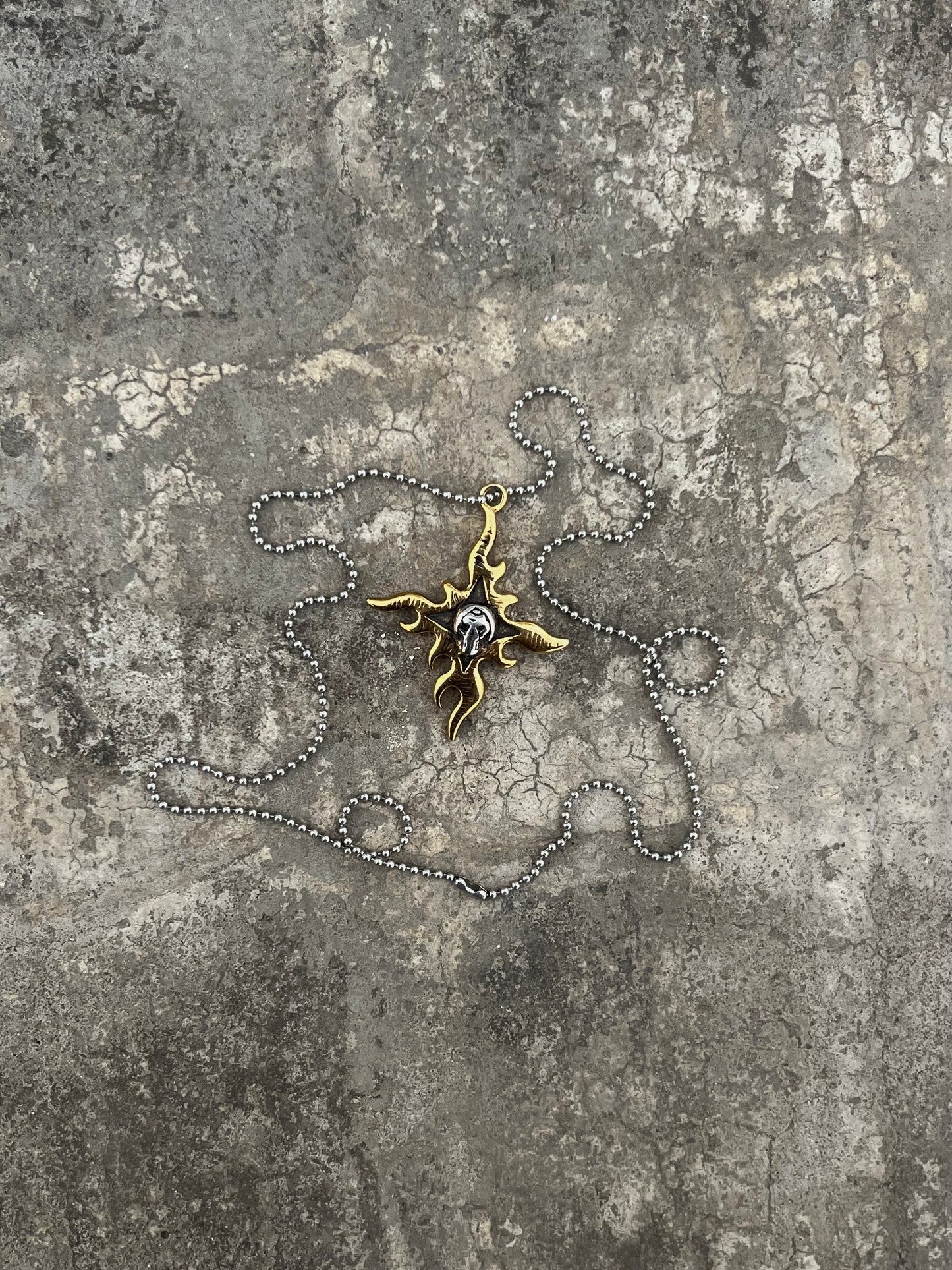Vintage Flaming Star Skull Pendant