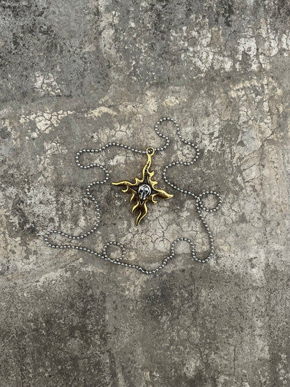 Vintage Flaming Star Skull Pendant