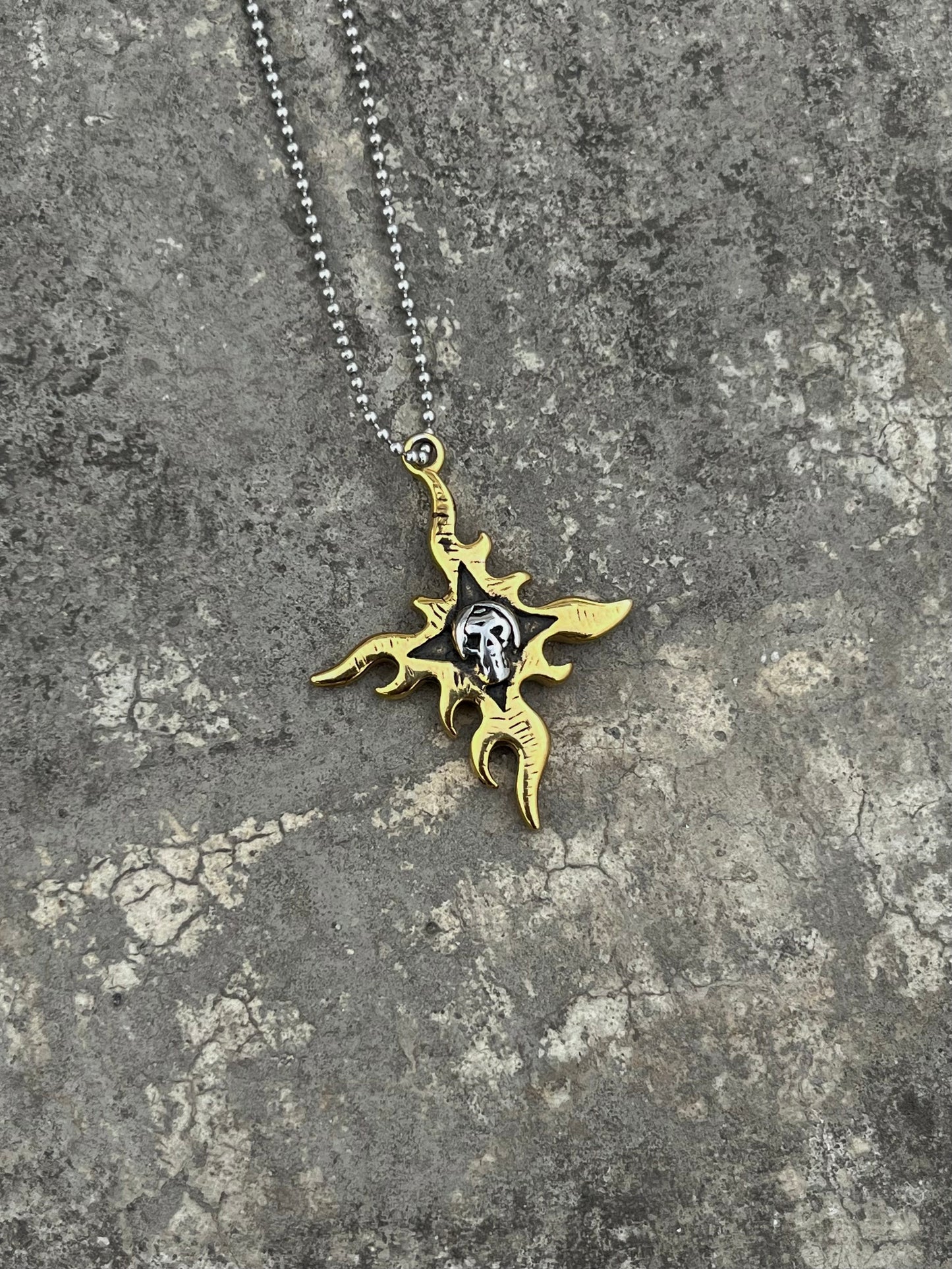 Vintage Flaming Star Skull Pendant