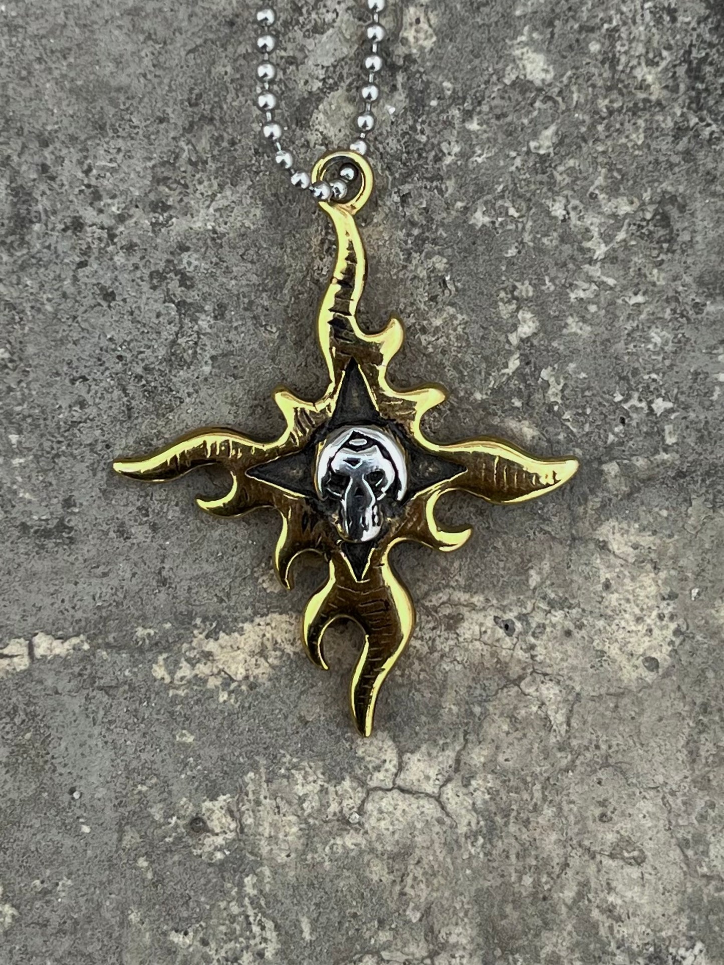 Vintage Flaming Star Skull Pendant